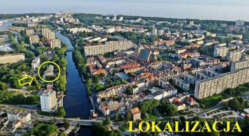 lokal między rzeką PARSĘTA a kanałem DRZEWNYM.