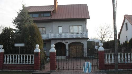 Dom z białej cegły na działce 2000 m2