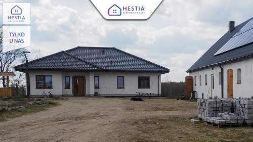 Luksusowy dom z dużą zagospodarowaną działką 