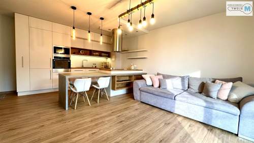 3 Pokoje w apartamentowcu z dużym tarasem.