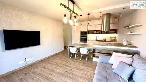 3 Pokoje w apartamentowcu z dużym tarasem.