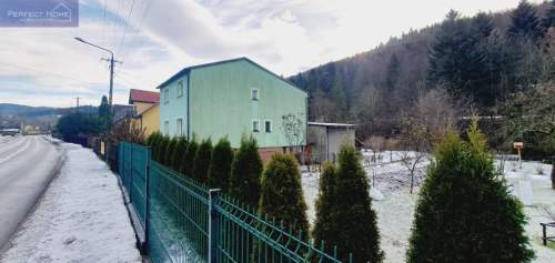 Dom dwurodzinny przy rzece z widokiem/ Brenna