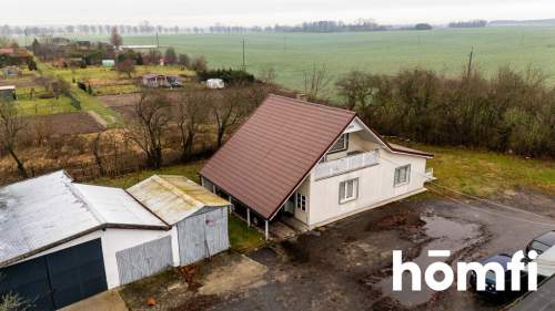 Dom jednorodzinny z zakładem produkcji schodów