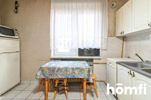 Dom z dwoma mieszkaniami i garażem