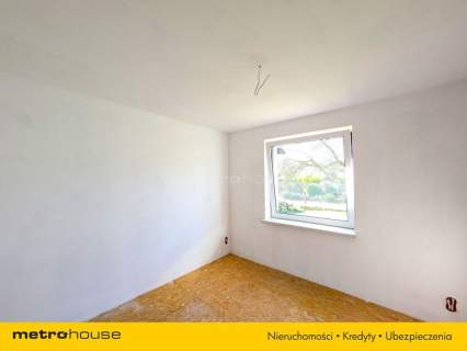 Rodzinny dom po remoncie z fotowoltaiką i garażem.