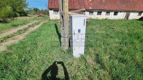 Duża działka rolna z zabudową produkcyjno-usług.