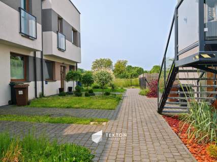 Dwupoziomowe mieszkanie w zabudowie szeregowej