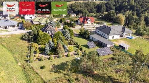 Dom z dużą działką oraz pięknym ogrodem