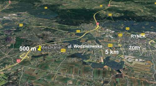 200 m od ul. Wodzisławskiej i od piekarni.