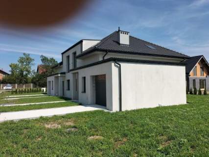 Bliźniak 140 m2, działka 450 m2. Stan deweloperski.