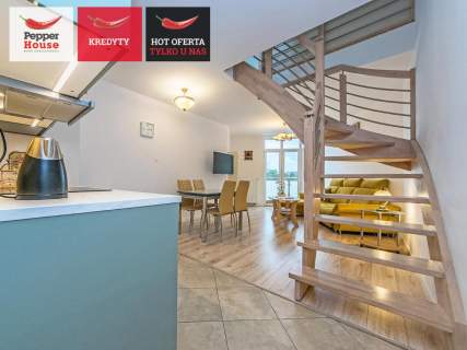 Dwupoziomowy apartament z bliskością morza