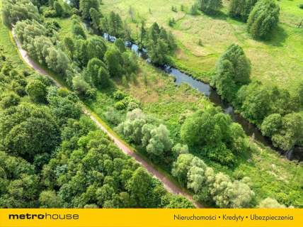 Działka z linią brzegową rzeki Pisy