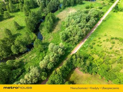 Działka z linią brzegową rzeki Pisy
