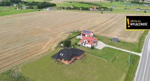 Dom na działce 2161 m2 w Łopusznie