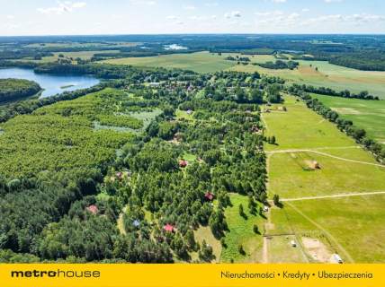 Przytulny dom w pięknej okolicy nad jeziorem.