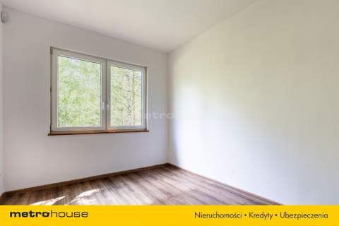 Przytulny dom w pięknej okolicy nad jeziorem.