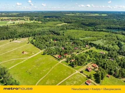Przytulny dom w pięknej okolicy nad jeziorem.