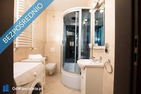 Kamienicę z apartamentami oraz częścią zorganizowanego prz