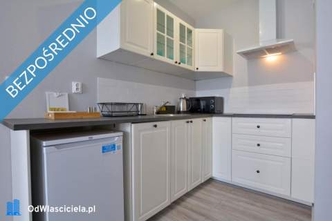 Kamienicę z apartamentami oraz częścią zorganizowanego prz