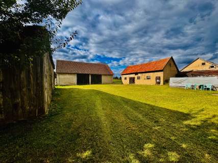Działka 5400 m w Drygałach z domem i zabudowaniami