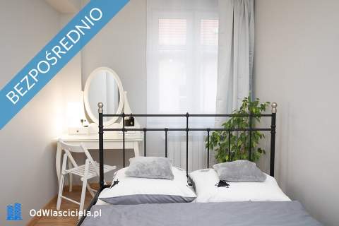 Kamienicę z apartamentami oraz częścią zorganizowanego prz