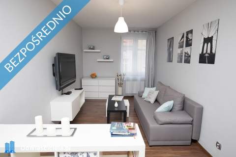Kamienicę z apartamentami oraz częścią zorganizowanego prz