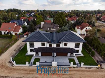 Połówka bliźniaka z garażem na 2 samochody