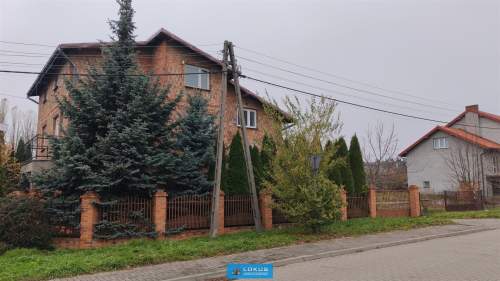 Dom 243 m2 z garażem i budynkami gospodarczymi