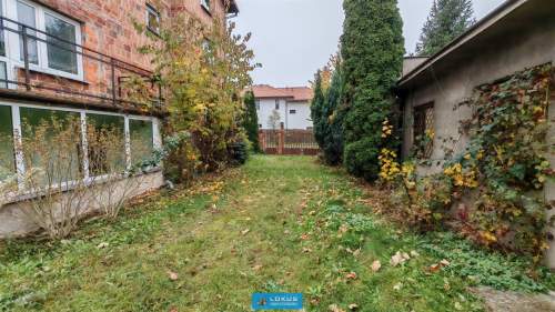 Dom 243 m2 z garażem i budynkami gospodarczymi