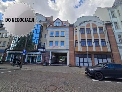 Kawalerka z wydz. sypialnią w centrum z miejscem parkingowym