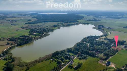 Sprzedam działkę nad jeziorem 