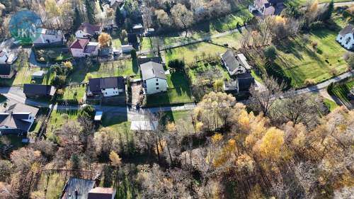 Trzy mieszkania w jednym domu działka i garaże