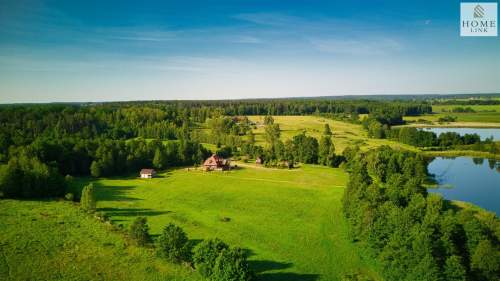 Olsztyn, dom z bala z linią brzegową