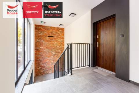 Dwupoziomowy apartament w otulinie lasu
