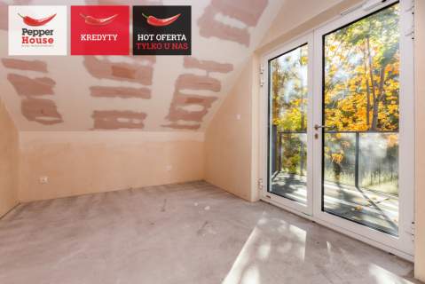 Dwupoziomowy apartament w otulinie lasu