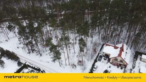 Działka budowlana 1000 m w otoczeniu lasu