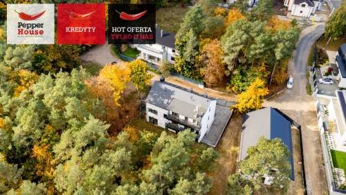 Dwupoziomowy apartament w otulinie lasu