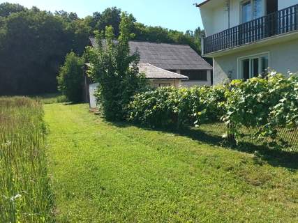 Sprzedam działką 14.3 ara zabudowaną domem i stodołą