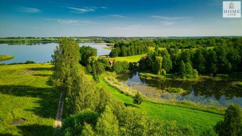 Olsztyn, dom z bala z linią brzegową