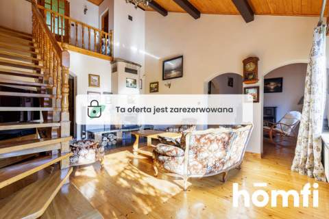Dom z ogrodem, basenem i kominkiem w Wawrze,