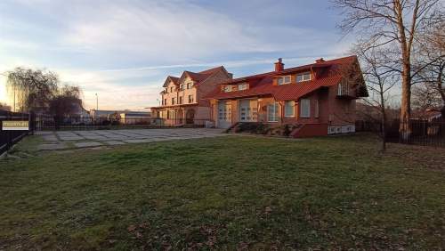 Budynek usługowo-mieszkalny z dużą halą garażową