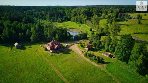 Olsztyn, dom z bala z linią brzegową