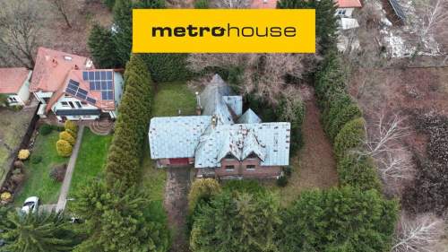 Dom z potencjałem na działce 1490 m2 w Sulejówku