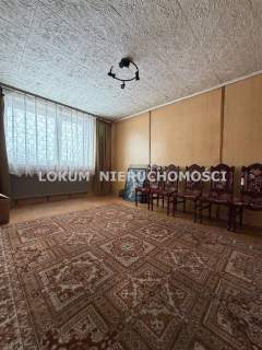 Dom z dużą działką i budynkiem gospodarczym