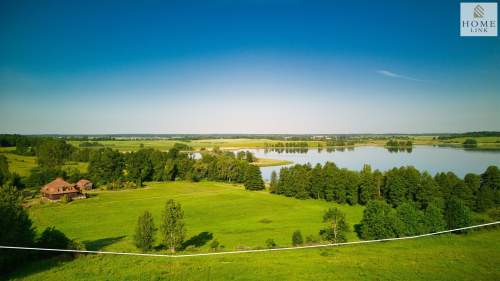 Olsztyn, dom z bala z linią brzegową