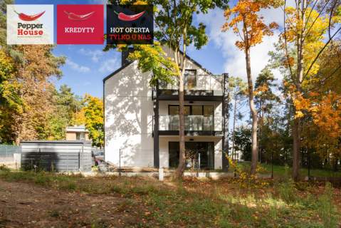 Dwupoziomowy apartament w otulinie lasu