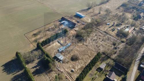 Duża działka rolna zabudowana budynkiem
