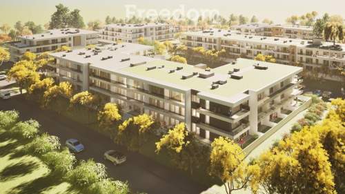 Gotowy nowy apartament z dużym zielonym tarasem.