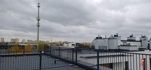 Apartament z antresolą i tarasem na dachu .