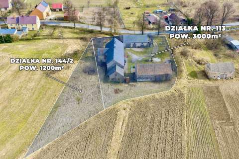 Dom z dużą działką i budynkami gospodarczymi